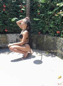 taking a shower in bathing suit