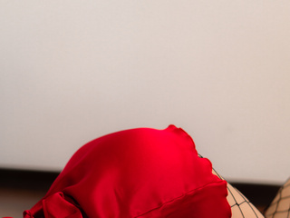 Aurora in mini red dress